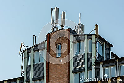 Rooftop of an office building with many mobile communications antennae.. Editorial Stock Photo