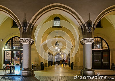 Gothic arcades of Cloth Hall on Main Market Square in Krakow by night Stock Photo