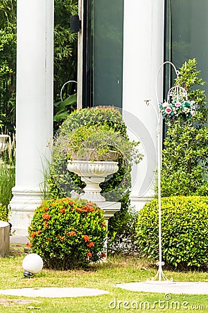 Gothic flower pot in garden. Stock Photo