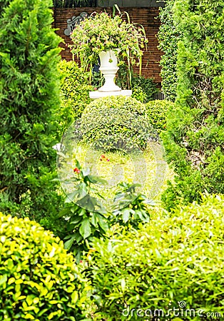 Gothic flower pot in garden. Stock Photo