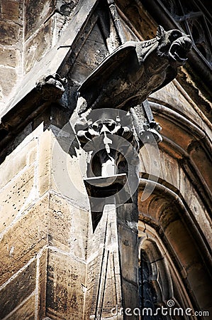 Gothic statue on walls of St Vitus Cathedral Stock Photo