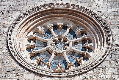 The Gothic Wheel Window also called as Rose Window or Catherine Window in the Santa Clara Church. Stock Photo
