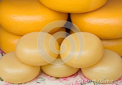 Gouda cheese rounds stacked Stock Photo
