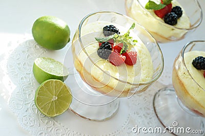 Gourmet dessert- strawberry souffle with lemon liquire and berries Stock Photo