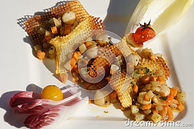 Gourmet dish Mille-feuilles of potato waffles and pan fried scallops Stock Photo