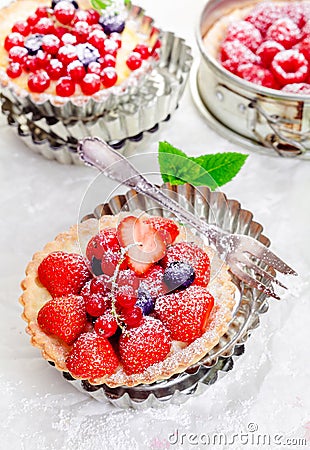 Gourmet fresh fruit tartlets with berries Stock Photo