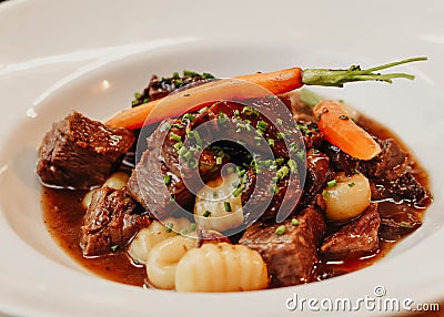 Gourmet gnocchi dish with beef ragu Stock Photo