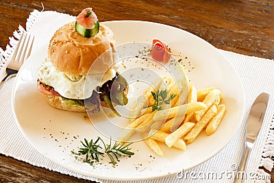 Gourmet hamburger and chips Stock Photo