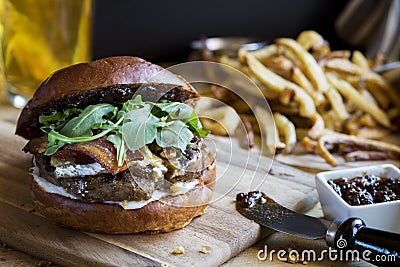 Gourmet hamburger with fig jam and french fries Stock Photo
