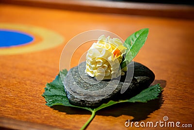 Gourmet design food. fresh butter on a stone and leaf Stock Photo