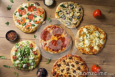 Gourmet Homemade Assorted Wood Fired Pizzas Stock Photo