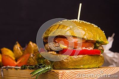 Gourmet homemade burger with garnish Stock Photo