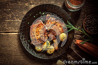 Gourmet meal of marinated pork cutlets Stock Photo