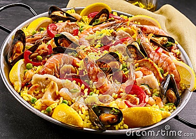 Gourmet seafood paella with prawns and mussels Stock Photo