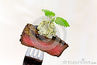 Gourmet Time,piece of a grilled steak with herb Stock Photo