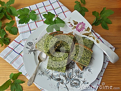 Goutweed ginger green cake on plate, organic food Stock Photo