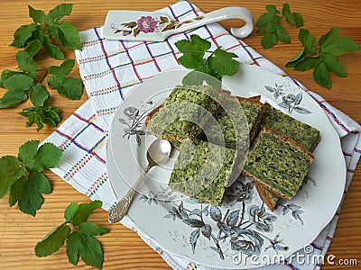 Goutweed ginger green cake on plate, organic food Stock Photo