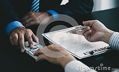 Government officials hand receiving bribe money from businessman, the concept of corruption and anti-bribery Stock Photo