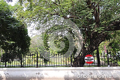 Outer fence of the Bharathi Park in Puducherry, India Stock Photo