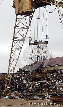 Gantry Crane Grabber Loading Scrap Metal At Junkyard Stock Photo