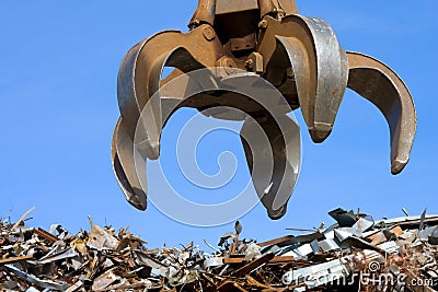 Grabber up on the metal heap Stock Photo