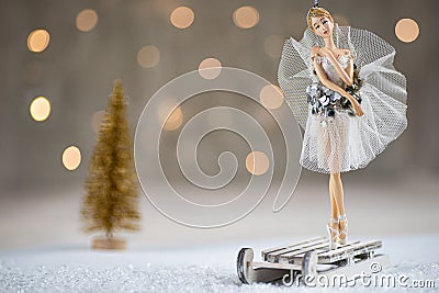 Graceful ballerina doll as a main character of Christmas and New Year postcard Stock Photo