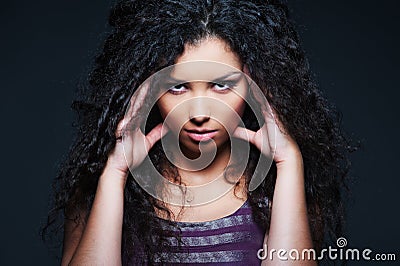 Graceful woman with curly hair Stock Photo