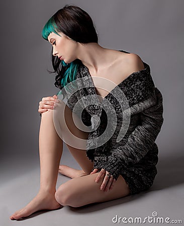 Graceful Woman in Sweater Stock Photo