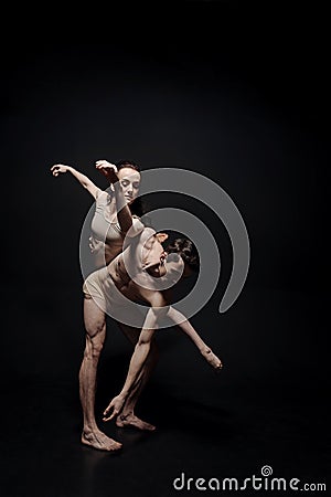 Graceful young gymnasts dancing together in the studio Stock Photo