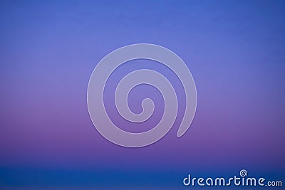 Gradient of the evening cloudless sky, blue and pink colors Stock Photo