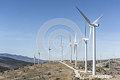 The `Grado de Pico` wind farm located in the municipality of AyllÃ³n Segovia located in the provinces of Soria, Segovia and Stock Photo