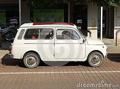 Sixties vintage car Fiat 500 Giardiniera at the road side. Editorial Stock Photo