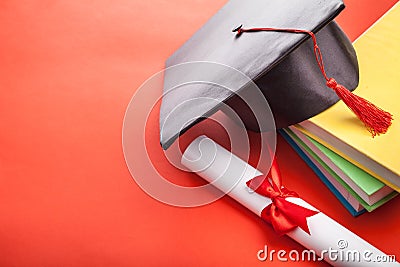 Graduate hat and book Stock Photo