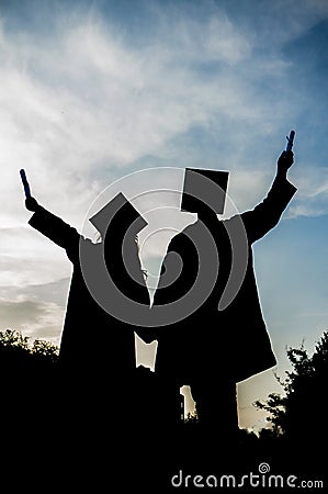 Graduated girl and boy silhouette, Graduation student, Girl and boy graduate, Stock Photo