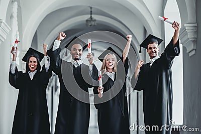 Graduates in university Stock Photo