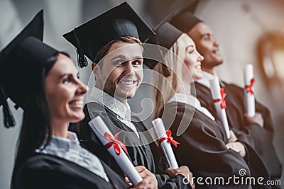 Graduates in university Stock Photo