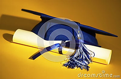 Graduation cap and diploma Stock Photo