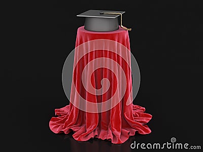 Graduation cap on table covered cloth Stock Photo