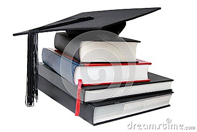 Graduation mortar on books Stock Photo
