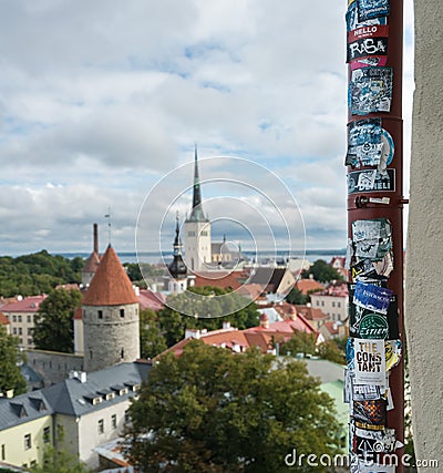 Graffiti and adverts above the old town of Tallinn Editorial Stock Photo