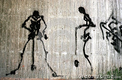 Graffiti on concrete wall: Death playing Jojo Editorial Stock Photo