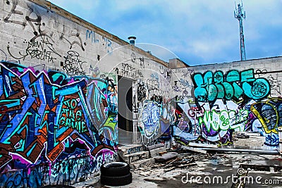 Graffiti on building walls Editorial Stock Photo