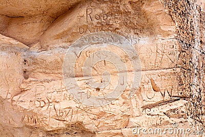 Graffiti carved into the limestone at Castle Rock Stock Photo