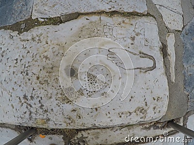 Graffiti carved into a slab of marble, Ephesus, Turkey Stock Photo