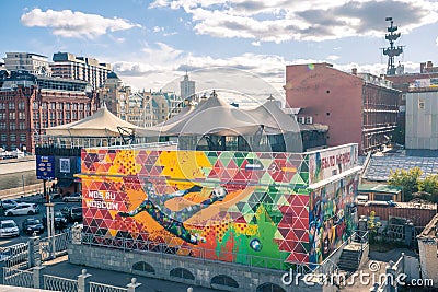 Graffiti in central Moscow depicting national russian football team goalkeeper kicked the spanish ball and made the way for the te Editorial Stock Photo