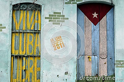 Graffiti of cuban flag and patriotic sign Stock Photo