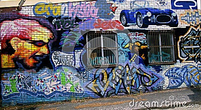 Graffiti on a factory wall Editorial Stock Photo