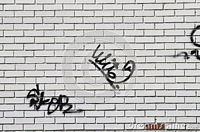 Graffiti on grunge wall Stock Photo