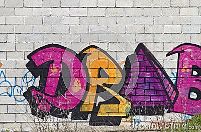 Graffiti on grunge wall Stock Photo