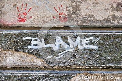 Blame Graffiti on Old Stone Wall Stock Photo